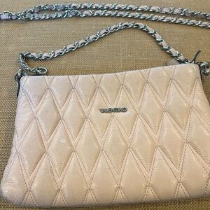 Valentino bag with two straps.
One short and one crossbody.
Bought at Saks